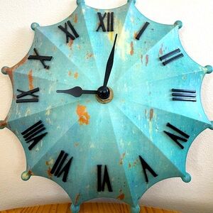 Very cute wall clock shaped umbrella!
